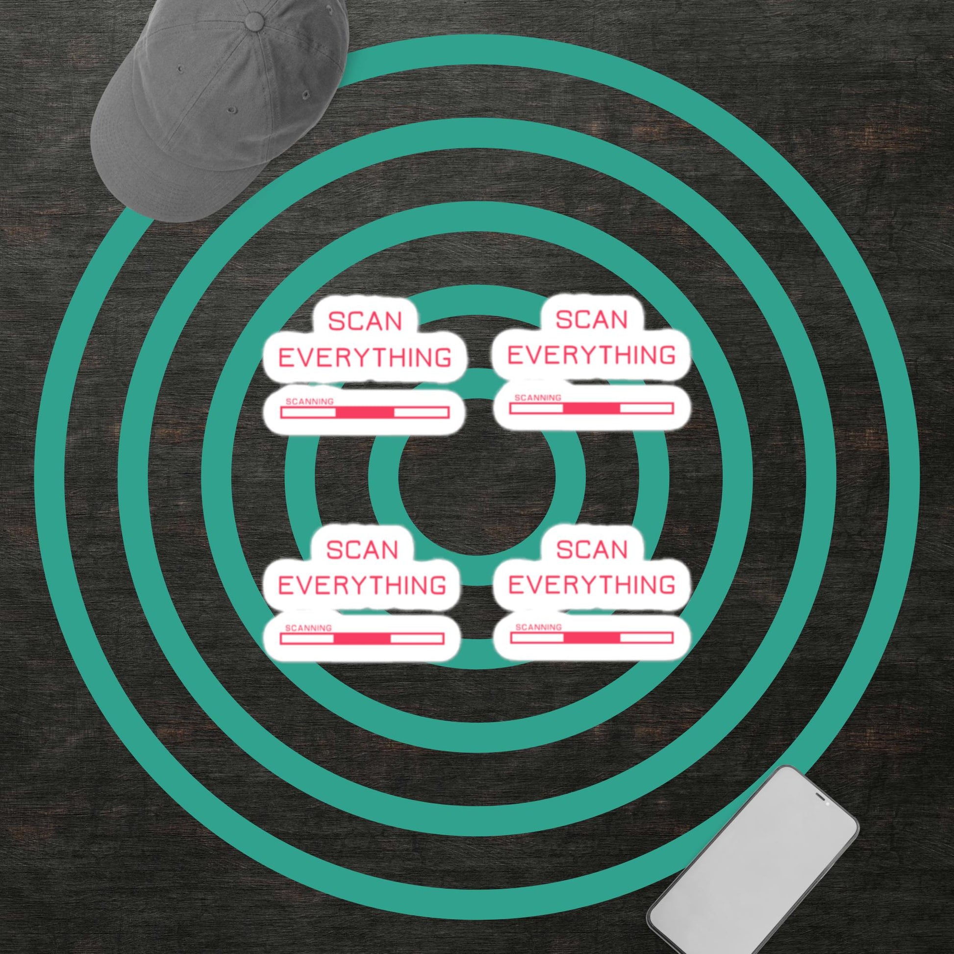 four sets of Scan Everything gamer merch vinyl stickers with pink text and graphics and a white border on a dark background with a grey baseball cap and a smart phone. mint green concentric circle graphic in background.