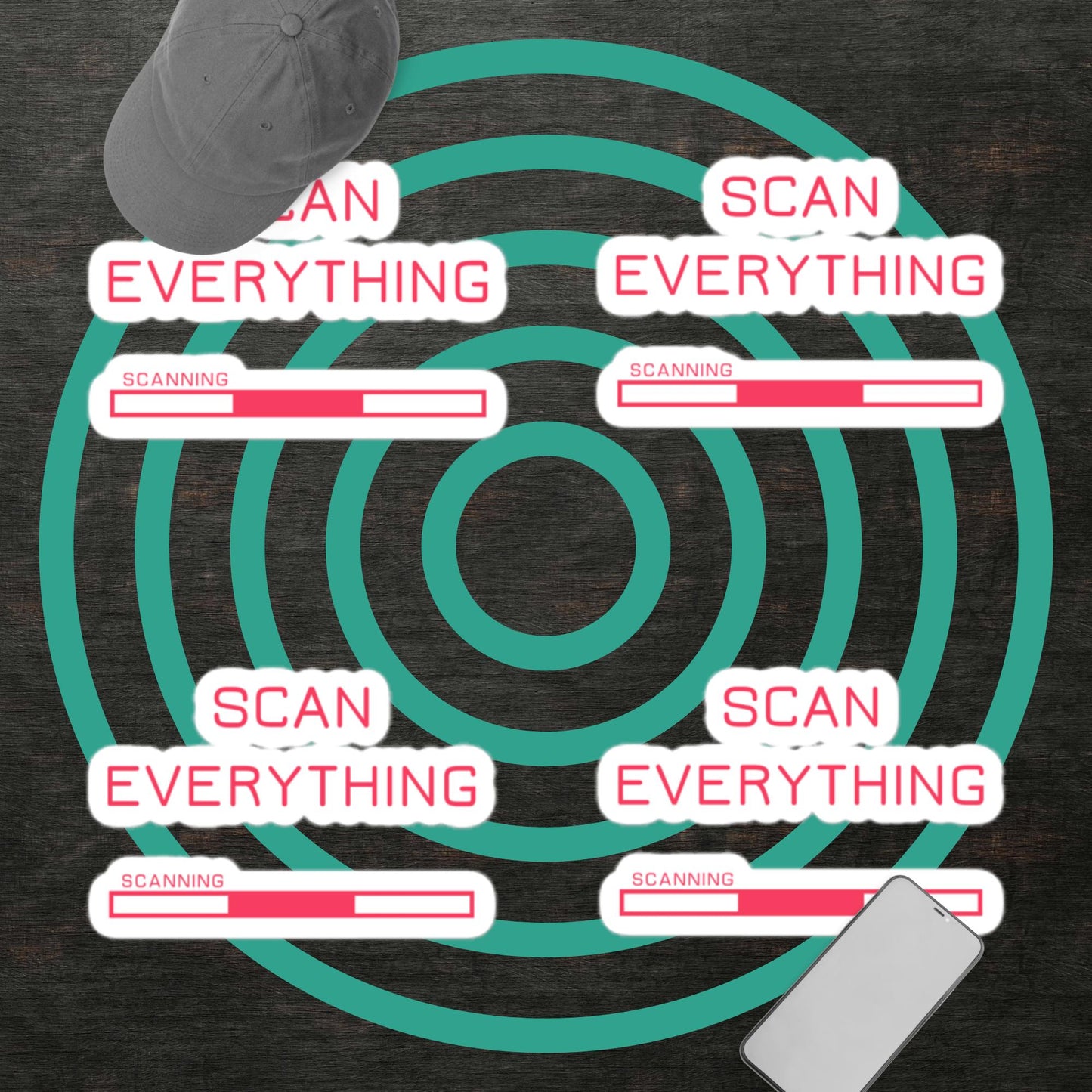 four sets of Scan Everything gamer merch vinyl stickers with pink text and four sets with pink progress bar graphics and a white border on a dark background with a grey baseball cap and a smart phone. mint green concentric circle graphic in background.