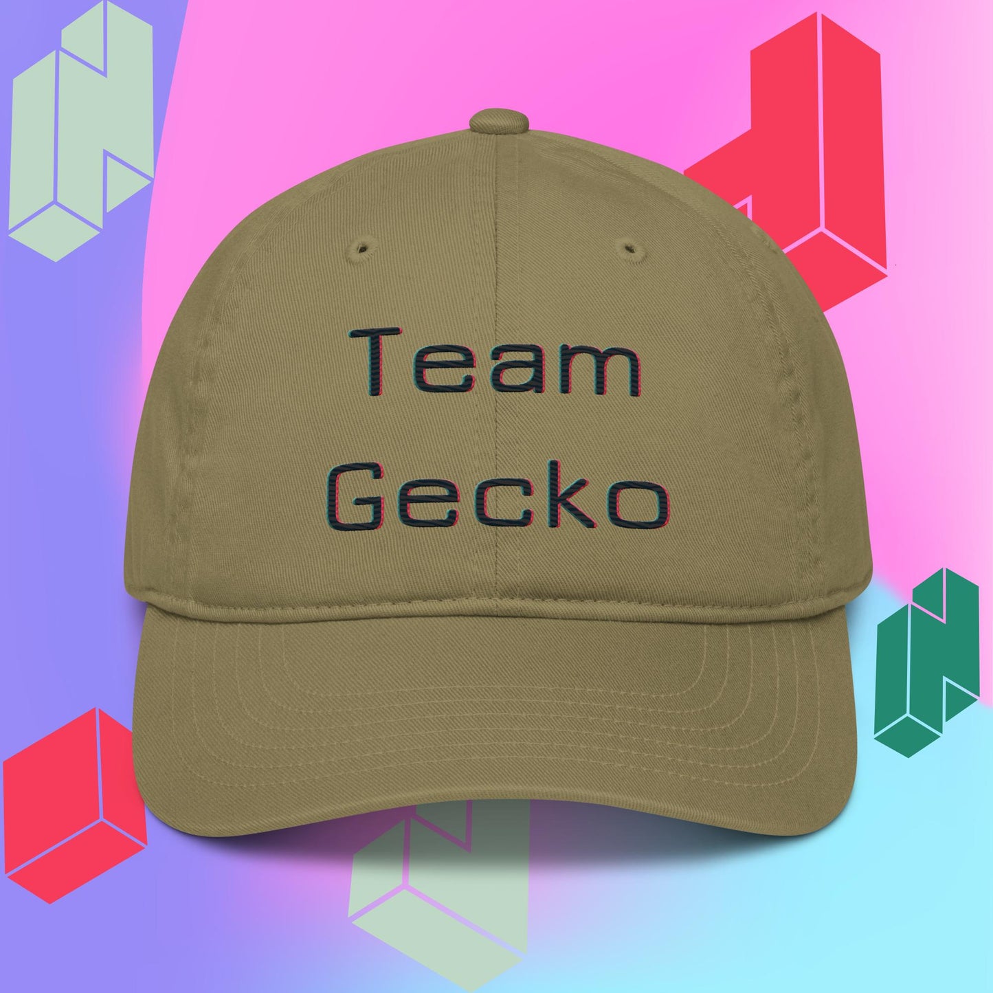 Jungle (khaki) organic cotton baseball cap with curved bill. Team Gecko glitch text embroidered on the front. Backdrop is purple pink and blue gradient with tetris style block graphics.
