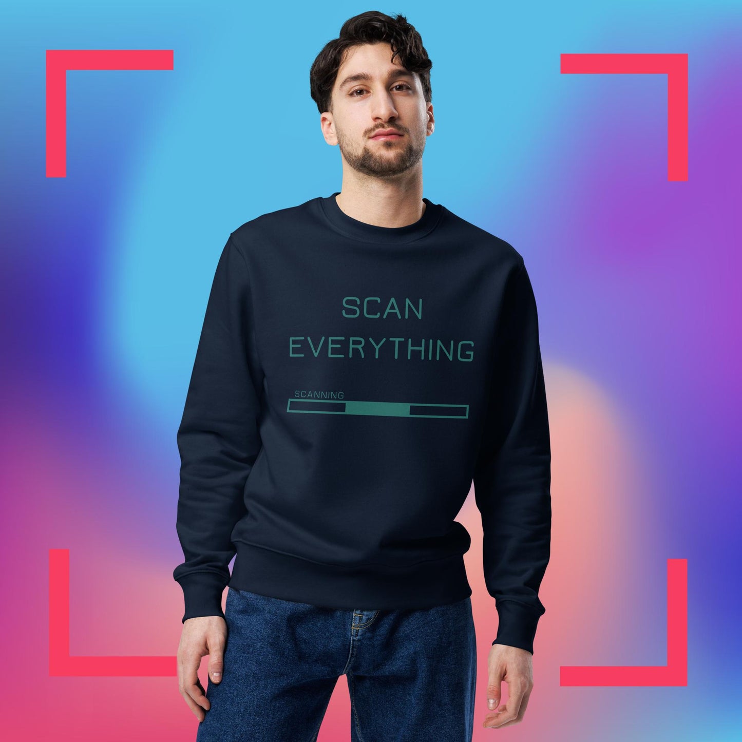 Front view of man wearing navy organic cotton gamer merch sweatshirt with mint green "Scan Everything " slogan and scanning progress bar graphic. The backdrop is blue, pink and purple gradient with pink graphics.